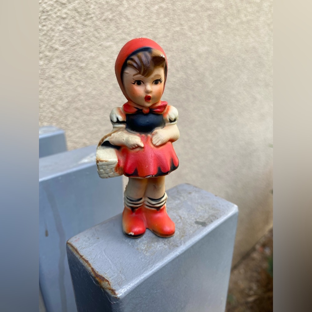 vintage 4-inch hard plastic figurine reminiscent of Hummel designs.
